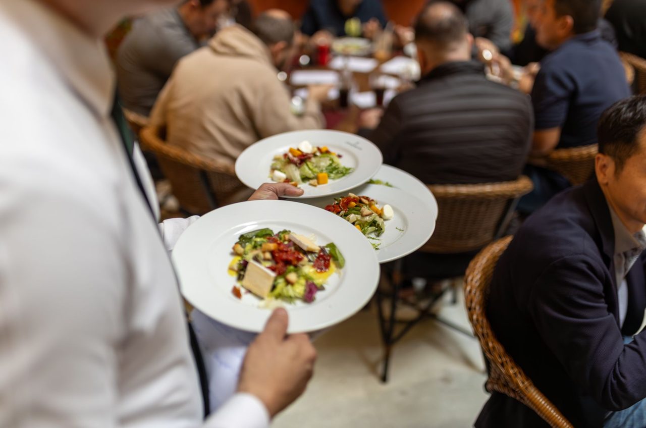 Satisfied dining customers enjoying meal at New Hampshire restaurant